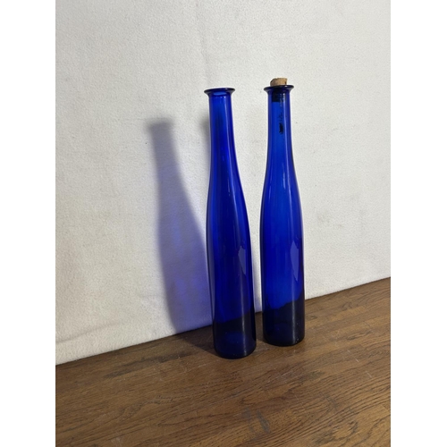 93 - Two Blue Long Neck Bottles