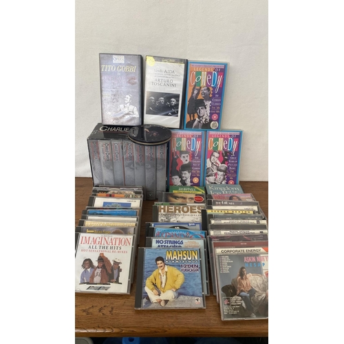 367 - Box of CDs and Video Cassettes