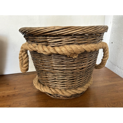 11 - Woven Basket with Rope Handles Together with a Hand Woven Straw Summer Bag with Wood Round Top Handl... 