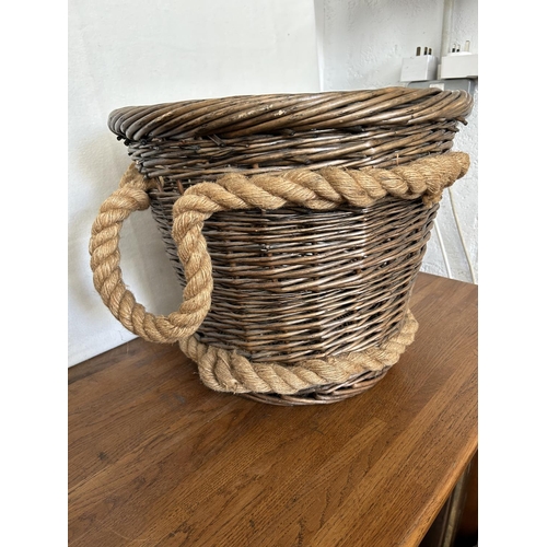 11 - Woven Basket with Rope Handles Together with a Hand Woven Straw Summer Bag with Wood Round Top Handl... 