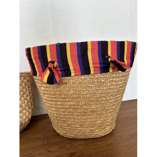 11 - Woven Basket with Rope Handles Together with a Hand Woven Straw Summer Bag with Wood Round Top Handl... 