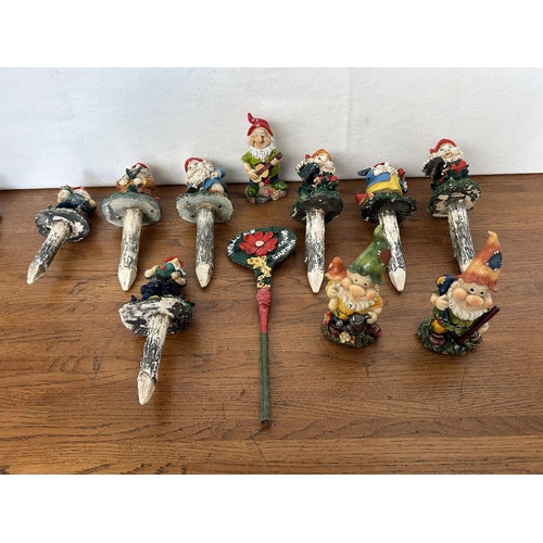 195 - Assorted Celebrating Garden Gnomes