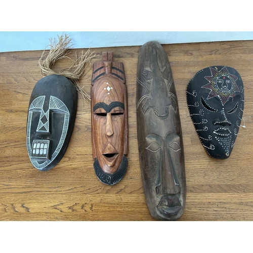 209 - Collection of 4 Vintage Wooden African Masks