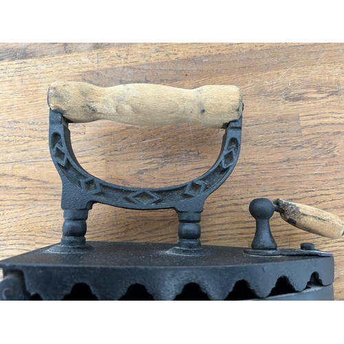 77 - Antique Cast Iron Charcoal Iron with Wooden Handle