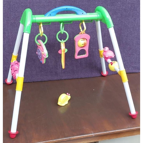 518 - Baby Carry Cot and Toys