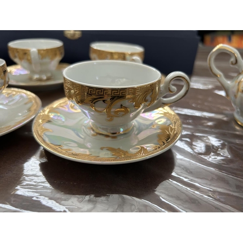 121 - Decorative Fine Gold Porcelain 13-Piece Coffee Set in Box (Unused)