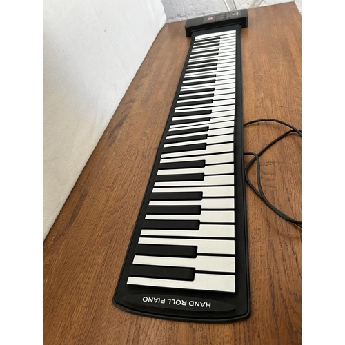 304 - 'Smaly' Handroll Portable Piano