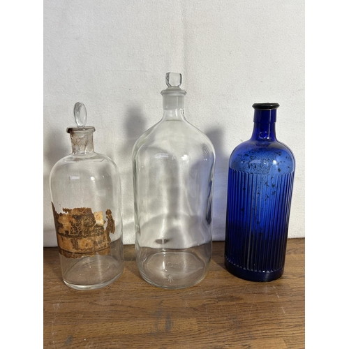 367 - Two Clear and One Blue Apothecary Bottles (x1 A/F)