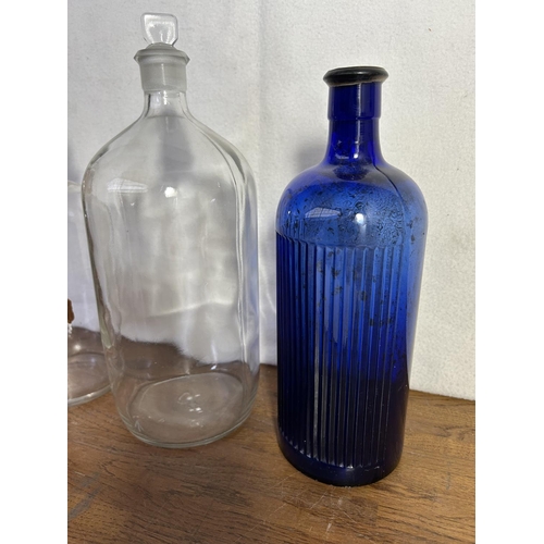 367 - Two Clear and One Blue Apothecary Bottles (x1 A/F)