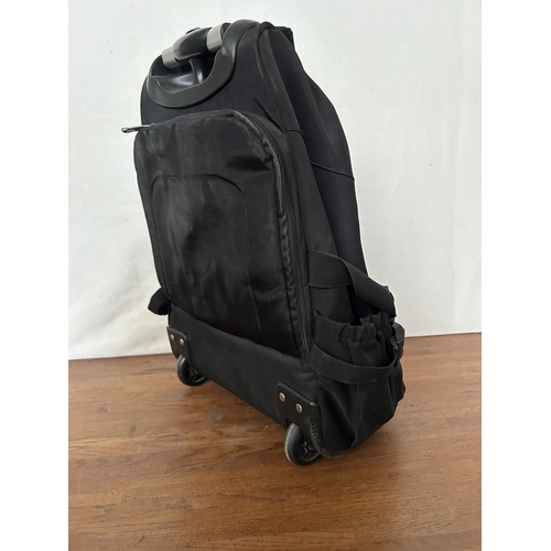 639 - Weishengda Wheeled Rolling Multi-Compartment Backpack