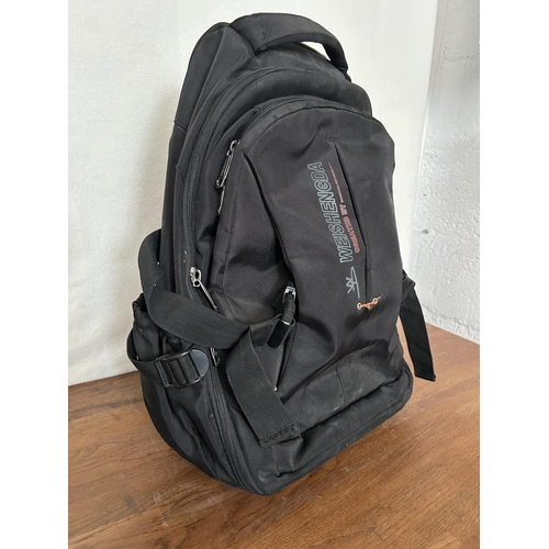 639 - Weishengda Wheeled Rolling Multi-Compartment Backpack