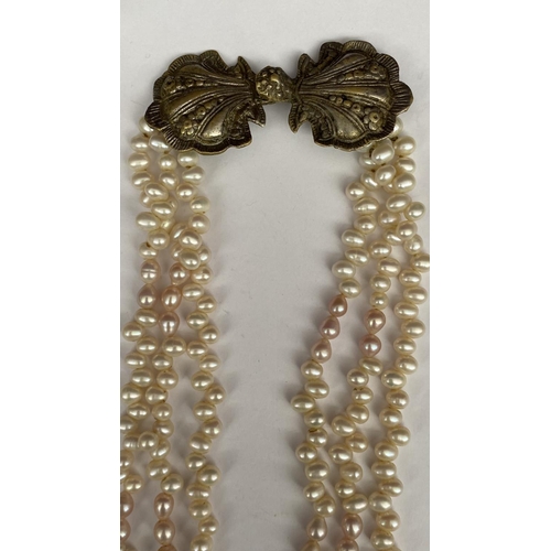 671 - Fresh Water Pearls 3-Strand Necklace with Large Antique Shell Clasp