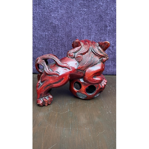 113 - Vintage Hand Carved Red Wood Chinese Foo Dog Cinnabar Oxblood with Rolling Ball in Mouth and Cage