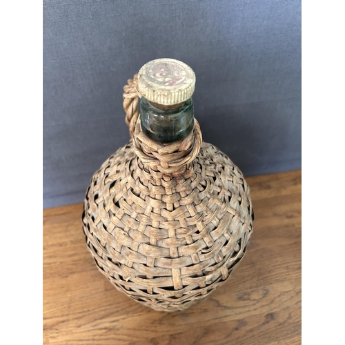 221 - Vintage 'LOEL' Wine Bottle in It's Basket (38cm H.)