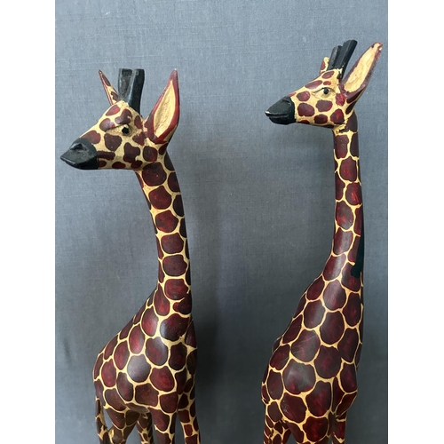 217 - x2 Carved Wood Tall Giraffe Sculptures (63xm H./each)