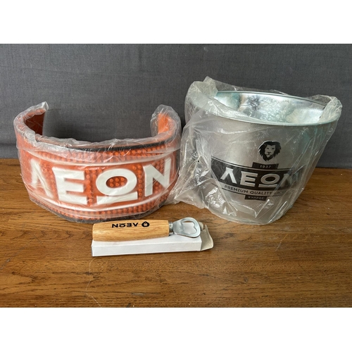 156 - x3 'Leon' Beer Collectibles, Ice Bucket, Rubber Drip Mat and Bottle Opener (Unused)
