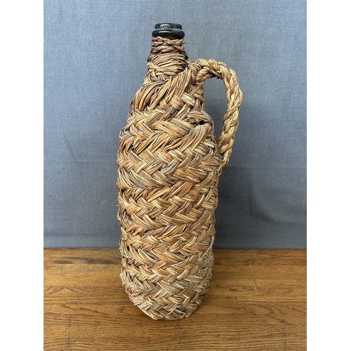 122 - Vintage Wine Bottle in it's Basket (43cm H.)