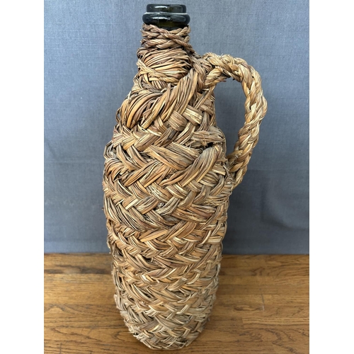 122 - Vintage Wine Bottle in it's Basket (43cm H.)