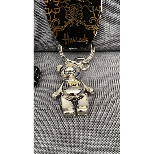 163 - Harrods Collectibles Incl. Jointed Bear, Black Taxi Cub Keyring, Address Book and English Blue Chees... 