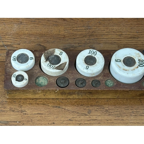 336 - Rare Antique Porcelain and Metal Scale Weight Set