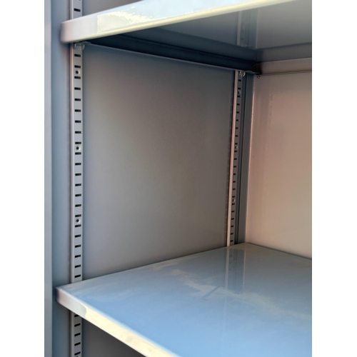 15B - Metal Storage Cabinet in Light Gray Finish with a Single Door and Lockable Handle (50 W. x 55 d. x 1... 