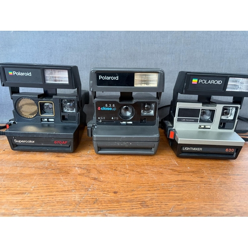 x3 Vintage Polaroid Instant Cameras