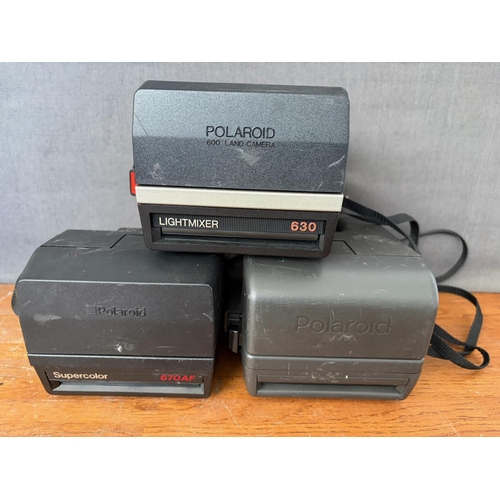 x3 Vintage Polaroid Instant Cameras
