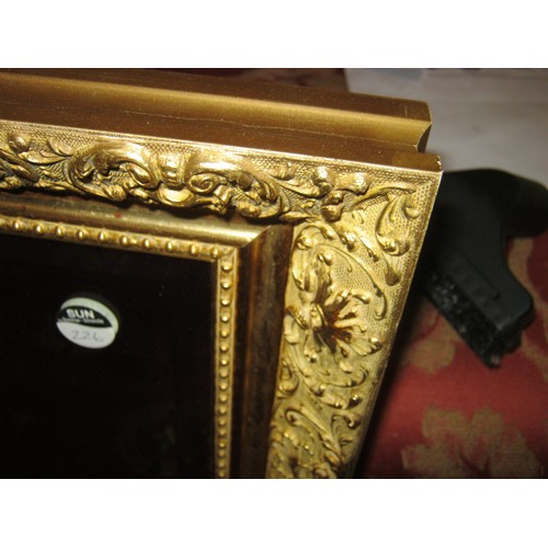 214 - A Large Gilt Framed Mirror 38