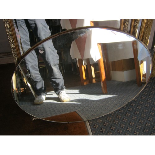 226 - An Oval Unframed Mirror 38