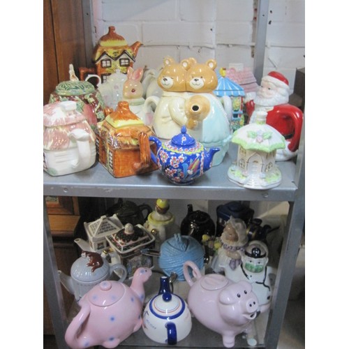 45 - 2 Shelves of Collectable Teapots including Wade, Old Country Roses, etc