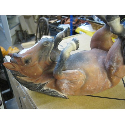 28 - Collection of bone china and other Rottweiler figures, plus other items a wooden horse bottle stand ... 