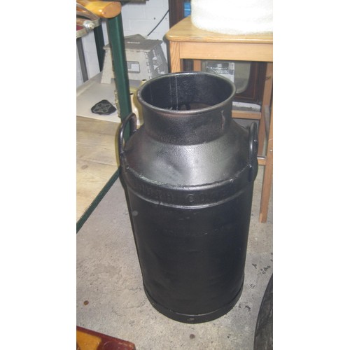 40 - A large 'South Coast Dairies' milk churn, black, a/f