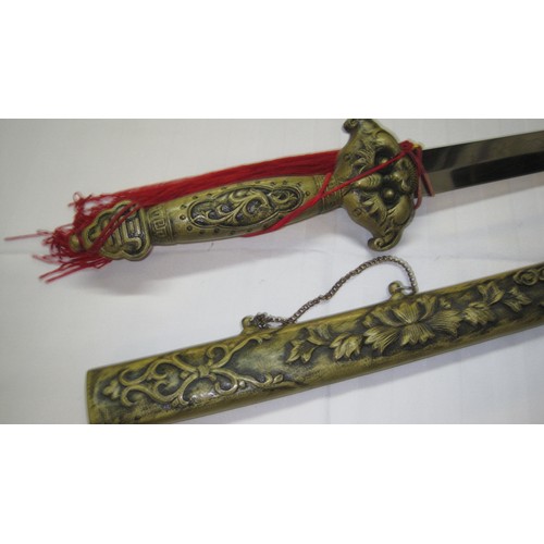 140 - A reproduction Asiatic sword