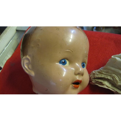 218 - A vintage porcelain/china doll by Pedigree of England, complete but internal rubber connectors peris... 