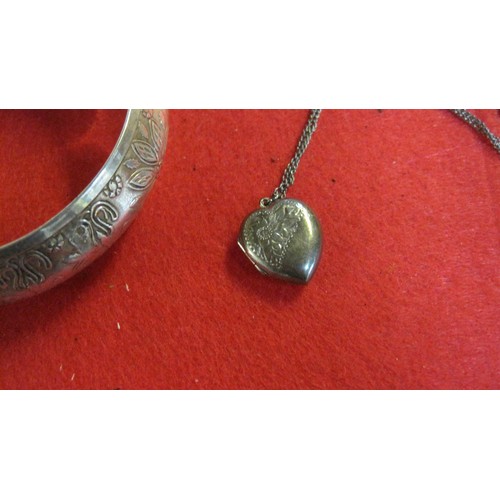 179 - Silver chain, locket and white metal bangle