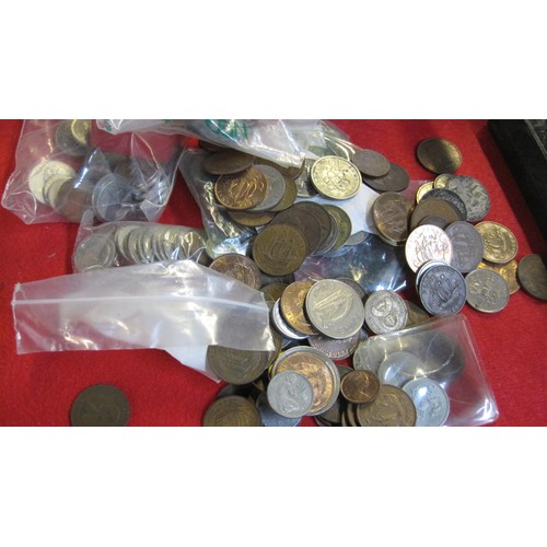 80 - A tube of mainly foreign coins and others