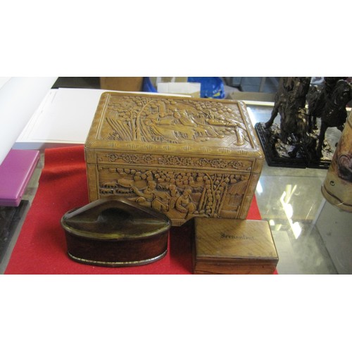 234 - A Carved Oriental Box containing a pair of smaller non-Oriental boxes