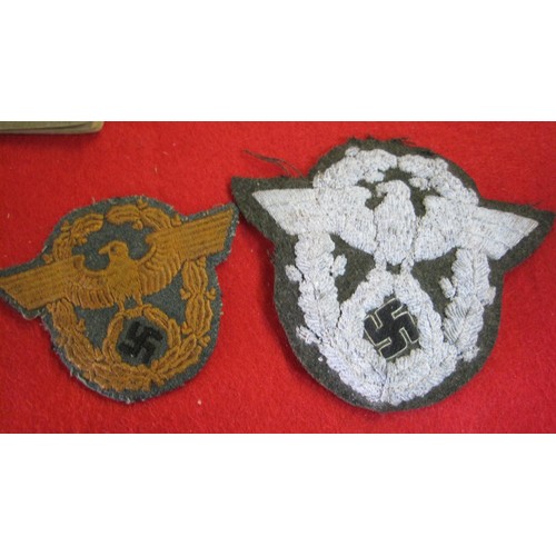 153 - A Pair of Nazi ID Documents and a Pair of Nazi Ordnungspolizei Cloth Badges