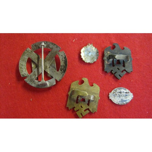 152 - An assortment of Nazi Metal badges including SS: we make no claims regarding originality of items, s... 