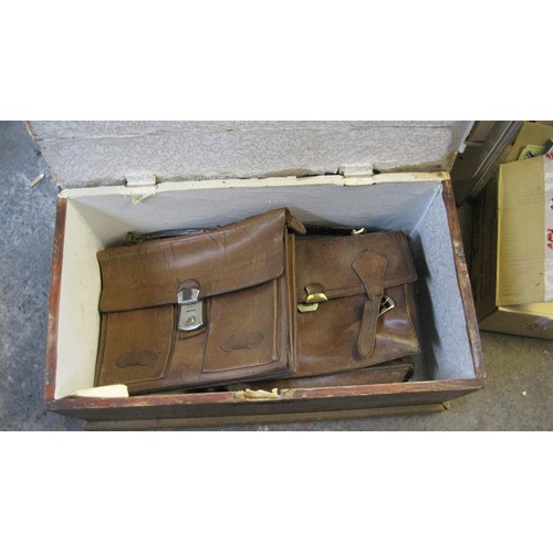 230 - A wooden footlocker containing leather and other bags