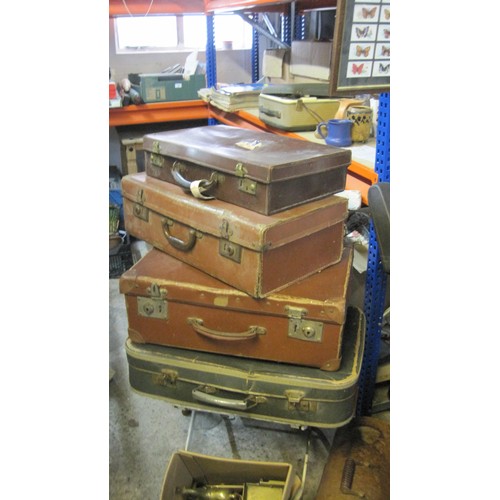 65 - A Stack of Vintage Suitcases