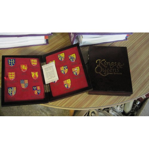 25 - A set of 'Kings & Queens' Magazines in binders plus 2 boxes of matching medals featuring coats of ar... 