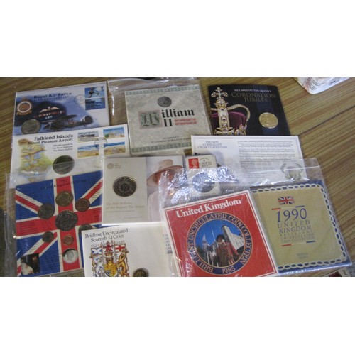 82 - An assortment of UK coins and coin sets including a silver proof