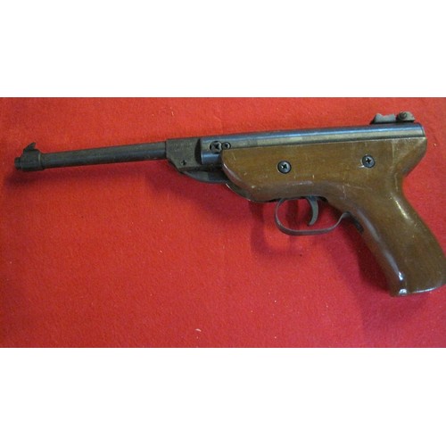 159 - A vintage Chinese made air pistol in .22 calibre, working