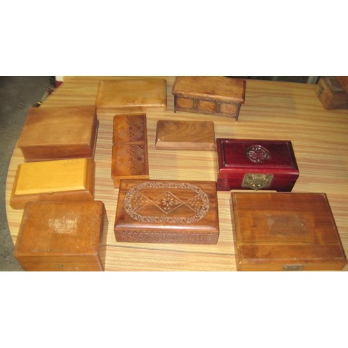 232 - An assortment of treen boxes including musical jewellery box