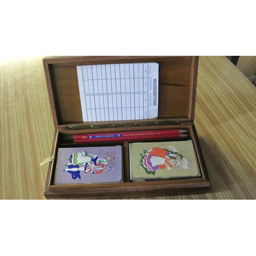 233A - An inlaid wooden Canasta box including vintage cards, pencils and scorecards