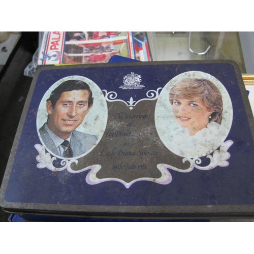 36 - Small tin box of collectibles