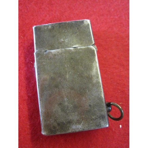 281 - A sterling silver petrol cigarette lighter marked 'Sterling Silver' and 'I.T.C.', the action spring ... 