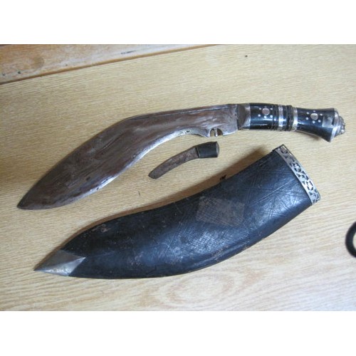 190 - A vintage Kukri in scabbard plus one other (not pictured) without a scabbard