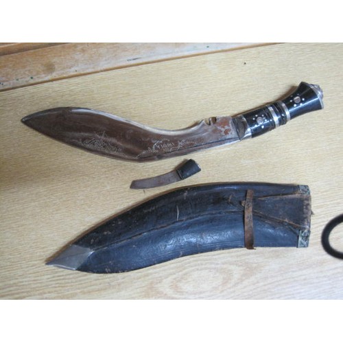 190 - A vintage Kukri in scabbard plus one other (not pictured) without a scabbard